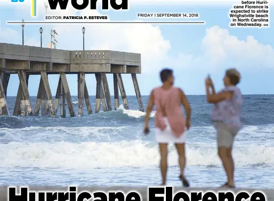  ?? EPA ?? Wind and waves begin to build at Johnny Mercer’s Fishing Pier less than two days before Hurricane Florence is expected to strike Wrighstvil­le beach in North Carolina on Wednesday.
