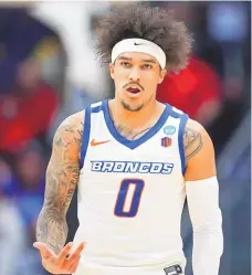  ?? AARON DOSTER / ASSOCIATED PRESS ?? Boise State guard Roddie Anderson III reacts to making a 3-point shot during a First Four game against Colorado on Wednesday in Dayton, Ohio.