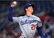  ?? (AP/Nick Wass) ?? Los Angeles Dodgers starting pitcher Walker Buehler, the two-time All-Star and former ace of the Dodgers’ rotation, was shut down for the rest of the season after his rehab from Tommy John surgery last year. A couple weeks into spring training, his exact timetable to return remains unclear.