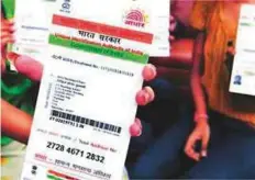  ??  ?? Indian residents need the Aadhaar card to obtain services, including SIM cards and opening bank accounts.
