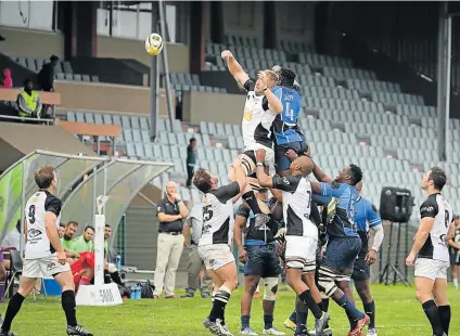  ?? Picture: ALAN EASON ?? GOING FOR IT: Old Boys and Swallows players compete for the ball at a lineout during the recent Gold Cup match between the two sides at the BCM Stadium