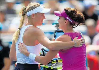  ?? Picture / Getty Images ?? Caroline Wozniacki (left) and her Agnieska Radwanska have been friends since they were juniors.