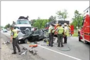  ?? KRISTI GARABRANDT — THE NEWS-HERALD ?? Multiple fire department­s and Ohio Highway patrol were on the scene of a fatal crash on Rt. 44 in Chardon on June 6.