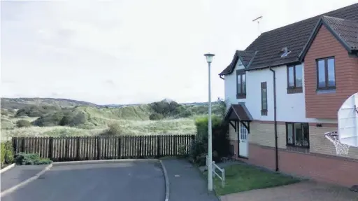  ??  ?? This family home in Porthcawl is surrounded by sand dunes. It is for sale with Thompsons Estate Agents, Porthcawl, for offers over 400k