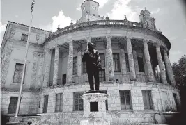  ?? Herald file ?? A statue of Coral Gables founder George Merrick is in front of City Hall.