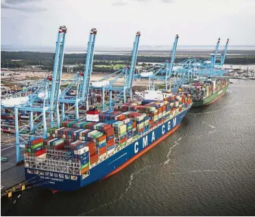  ?? — AP ?? Growing business: A file picture shows the CMA CGM Theodore Roosevelt being unloaded at the Virginia Internatio­nal Gateway in Norfolk. CMA CGM says it is ordering nine new vessels due to better business.