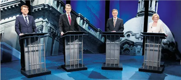  ?? JASON FRANSON/ THE CANADIAN PRESS ?? From left, Wildrose Leader Brian Jean, Liberal interim leader David Swann, PC Leader Jim Prentice and NDP Leader Rachel Notley at the leaders’ debate