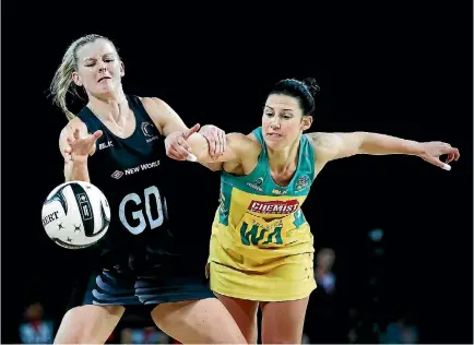  ?? PHOTO: PHOTOSPORT ?? Katrina Grant, left, and the Silver Ferns have won just five of their past 20 matches against the Australian Diamonds.