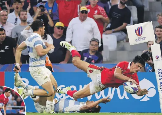  ?? GETTY IMAGES ?? Louis Rees-Zammit, above, in action for Wales during last year’s Rugby World Cup, quit rugby on the eve of the Six Nations to pursue a career in the NFL.