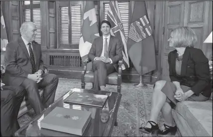  ?? CP PHOTO ?? Prime Minister Justin Trudeau, B.C. Premier John Horgan, left, and Alberta Premier Rachel Notley, sit in Trudeau’s office on Parliament Hill in Ottawa for a meeting on the deadlock over Kinder Morgan’s Trans Mountain pipeline expansion.