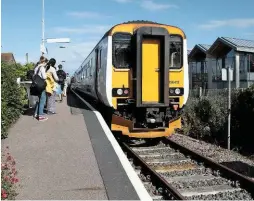  ?? ANTONY GUPPY. ?? On June 9, Greater Anglia 156402 stands at Sheringham. The one-platform station is at the end of the 30½-mile line from Norwich, which includes a reversal at Cromer. In two years’ time, new bi-mode trains will replace the current fleet, and all trains will be at least three-car.