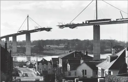  ??  ?? „ The Erskine Bridge, which is the last crossing on the Clyde before it widens into a firth, seen here during its constructi­on in 1971.