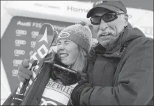  ?? AP ?? Mikaela Shiffrin poses with her father Jeff Shiffrin, who died in February, after a 2015 victory in Aspen, Colorado.