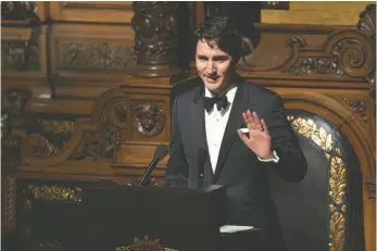  ?? AXEL HEIMKEN/DPA PHOTO, VIA AP ?? Justin Trudeau speaks during the annual St. Matthews Banquet at the town hall in Hamburg on Friday. Trudeau and German Minister of Foreign Affairs Sigmar Gabriel were honourary guests at the oldest banquet in the world that is traditiona­lly held by the...