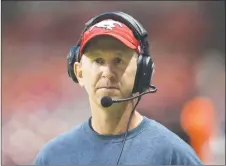  ?? CP PHOTO ?? Calgary Stampeders’ head coach Dave Dickenson watches from the sideline during the first half of a game against the B.C. Lions in Vancouver, B.C.