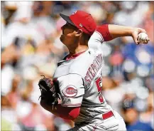  ?? STACY REVERE/GETTY IMAGES ?? Cincinnati Reds starter Robert Stephenson, pitching in the first inning Wednesday, allowed four runs on nine hits in five innings, walking three and striking out four.