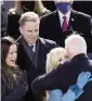  ?? CAROLYN KASTER AP ?? President Joe Biden hugs first lady Jill Biden, as son Hunter Biden and daughter Ashley Biden look on at the inaugurati­on Jan. 20. Hunter Biden has written a new memoir, ‘Beautiful Things.’