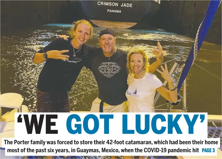  ??  ?? Cole, Brad and Krista Porter heading through the Panama Canal on their 42-foot catamaran Saltair 3.