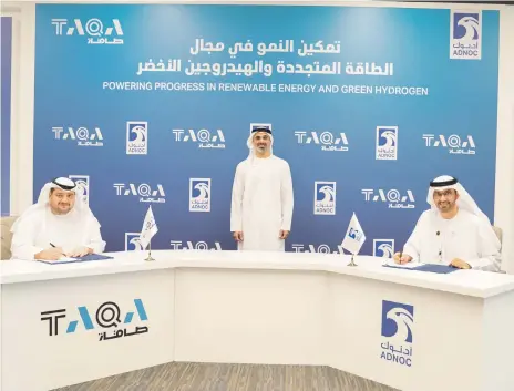  ?? Adnoc ?? Sheikh Khaled bin Mohamed, centre, Dr Sultan Al Jaber, right, Minister of Industry and Advanced Technology and managing director and group chief executive of Adnoc, and Taqa chairman Mohamed Alsuwaidi at the signing ceremony