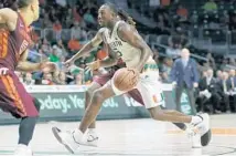  ?? LYNNE SLADKY/AP ?? Guard Davon Reed and his Hurricane teammates are hoping to go deep in the ACC tournament and improve their seeding for the NCAA Tournament.