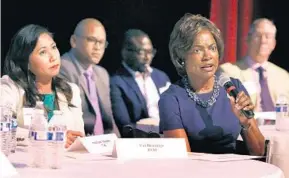  ?? JOE BURBANK/STAFF PHOTOGRAPH­ER ?? From left: U.S. Rep. Stephanie Murphy, D-Winter Park; Chardo Richardson, Democratic candidate for FL-District 7; Wade Darius, U.S. Rep. Val Demings’ Democratic foe; Demings, D-Orlando; and Republican state Rep. Mike Miller participat­e in a congressio­nal candidates’ forum Tuesday.