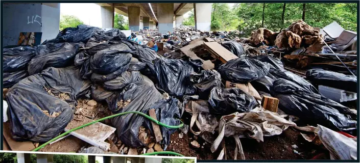  ?? ?? EYESORE: Fly-tipping at the junction of the M80 and M8 in Glasgow