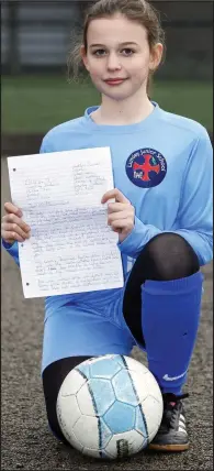  ??  ?? Seeing red: Player Grace with her letter to the FA