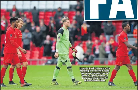  ??  ?? Liverpool paid the price for fielding a weakened team and were dumped out of the FA Cup by Wolves, a Championsh­ip team 34 places below them