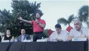  ?? DOUGLAS HANKS dhanks@miamiheral­d.com ?? Hialeah Mayor Carlos Hernández addresses a meeting of residents about the city’s push to open overpasses on 154th and 170th streets on Aug. 21, 2019.