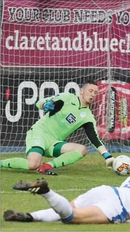  ??  ?? Drogheda United’s Mark Doyle watches as his powerful shot is palmed away by