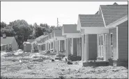  ?? NWA Democrat-Gazette/SPENCER TIREY ?? Rows of houses are under constructi­on in the Mansions, a multifamil­y developmen­t off Mill Street in Springdale.