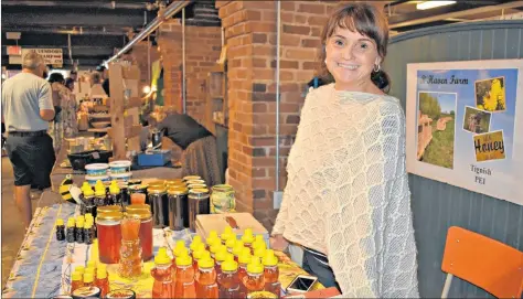  ?? DESIREE ANSTEY/JOURNAL PIONEER ?? Heather Mills sells buckwheat and clover honey at the Summerside Farmers’ Market Saturday mornings. She produces her honey at B’Haven Farm, which is located in Tignish