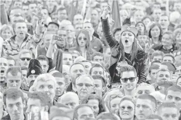  ??  ?? Supporters of Seselj attend his rally in Belgrade. — Reuters photo