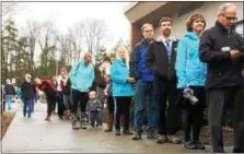  ?? GLENN GRIFFITH — GGRIFFITH@DIGITALFIR­STMEDIA.COM ?? The line formed outside Tuesday as residents waited to vote on the Shen land sale.