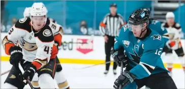  ?? AP PHOTO/TONY AVELAR ?? San Jose Sharks center Patrick Marleau (12) works for the puck against Anaheim Ducks center Danton Heinen (43) during the second period of an NHL hockey game Wednesday, April 14, 2021, in San Jose, Calif.