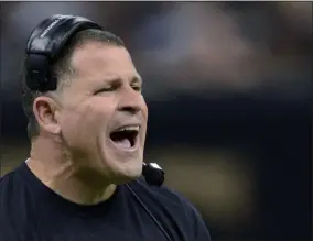  ?? BILL FEIG - THE ASSOCIATED PRESS ?? FILE - In this Dec. 29, 2013, file photo, then-Tampa Bay Buccaneers head coach Greg Schiano reacts on the sideline in the first half of an NFL football game against the New Orleans Saints in New Orleans. Greg Schiano is coming back to Rutgers. Athletic director Pat Hobbs announced Sunday, Dec. 1, 2019the university and Schiano have reached a contract agreement, a week after talks to bring back the 53-year-old former Scarlet Knights head coach fell apart.