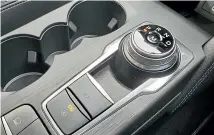  ??  ?? While the automatic transmissi­on is superb, we’re still not sold on the rotary dial gear selector.