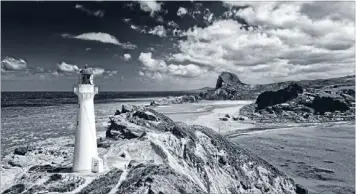  ?? Photo: NORBERT RUPP ?? Beacon: An old Marine Department brochure describes Castle Point Lighthouse in Wairarapa as “one of the most popular lights for keepers”. The lighthouse was first lit in 1913.