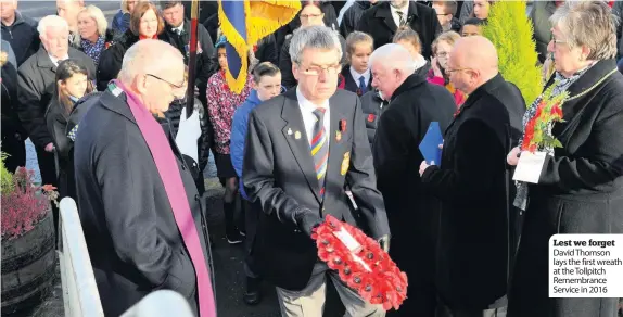  ??  ?? Lest we forget David Thomson lays the first wreath at the Tollpitch Remembranc­e Service in 2016