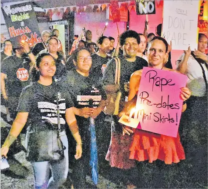  ?? Picture: ATU RASEA ?? Women with their placards during the Reclaim the Night march along the streets of Suva on Wednesday.