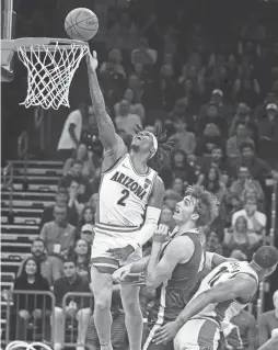  ?? PATRICK BREEN/THE REPUBLIC ?? Arizona guard Caleb Love goes up for a shot against Alabama on Wednesday night at Footprint Center in Phoenix.