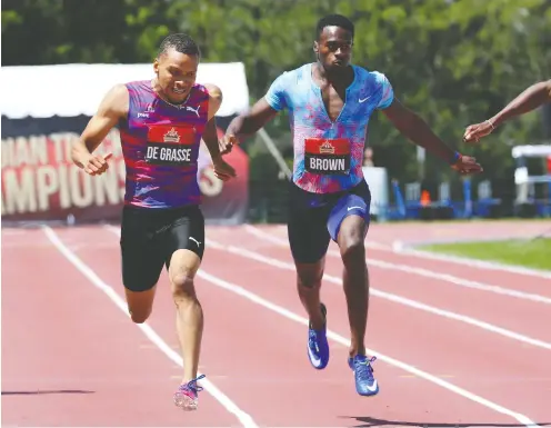  ?? FRED CHARTRAND / THE CANADIAN PRESS FILES ?? Canadian sprinters Andre De Grasse, left, and Aaron Brown are eating up the track this season with world-class speed.