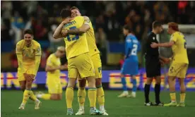  ?? Photograph: Kacper Pempel/Reuters ?? Ukraine celebrate at the final whistle after beating Iceland to qualify for Euro 2024.