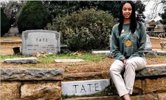  ?? ANN HARDIE FOR THE AJC ?? Jihan Hurse leads tours of the African American Grounds at the Historic Oakland Cemetery. Among those buried is entreprene­ur James Tate, the city’s first African American business owner.