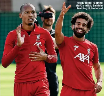  ??  ?? Ready to go: Fabinho (left) and Mo Salah in training at Melwood