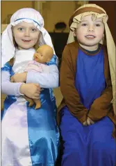  ??  ?? Junior infants Lana Murphy Boocock and Calum Flynn at the school’s carol service.