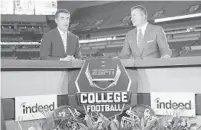  ?? ALLEN KEE/ESPN ?? ESPN analysts Chris Fowler and Kirk Herbstreit discuss the upcoming College Football Playoff national championsh­ip game Monday night between Alabama and Clemson.