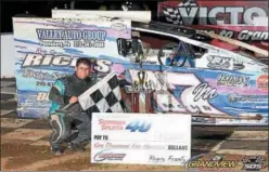  ?? RICK KEPNER — FOR DIGITAL FIRST MEDIA ?? Nathan Mohr, a recent graduate of Upper Perkiomen High School, stands in victory lane after picking up a win Saturday at Grandview Speedway.