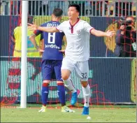  ?? FABIO MURRU/ANSA VIA AP ?? Cagliari’s Han Kwang-song celebrates scoring in his side’s 3-2 loss to Torino, becoming the first player from the Democratic People’s Republic of Korea to net in Serie A.
