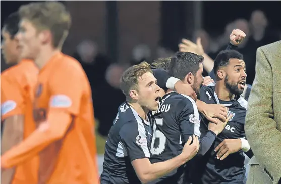  ??  ?? Dundee celebrated relegating their city rivals, United, last season. Could they, too, be Championsh­ip bound?